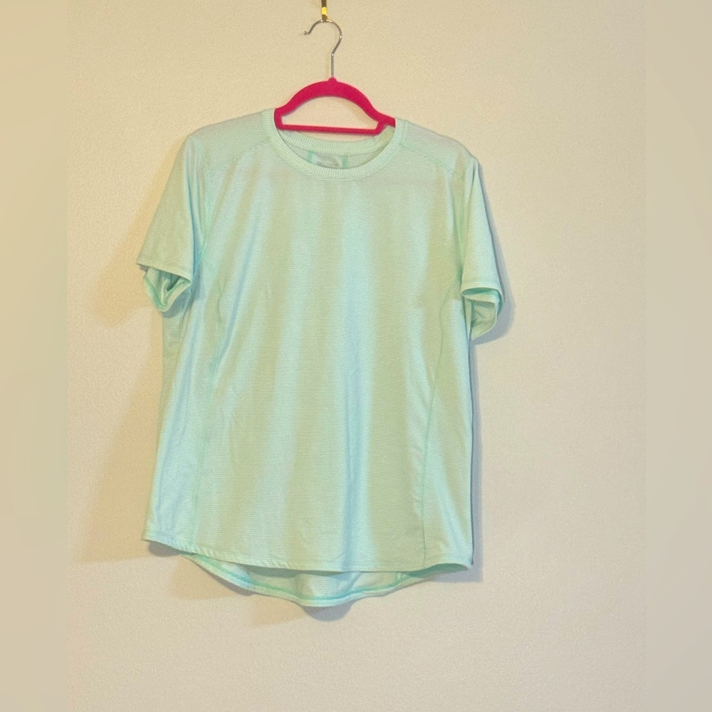 Duluth Trading Co. Woman’s white and green athletic top